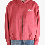 Red jacket worn by a person, showing the jacket's fit