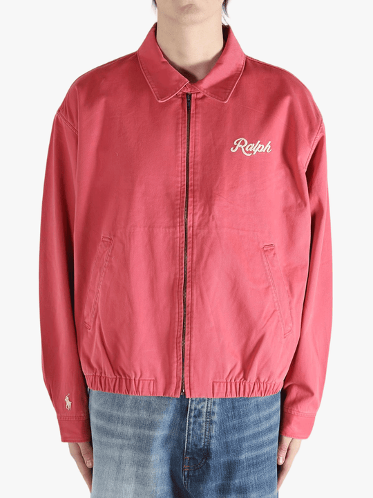 Red jacket worn by a person, showing the jacket's fit