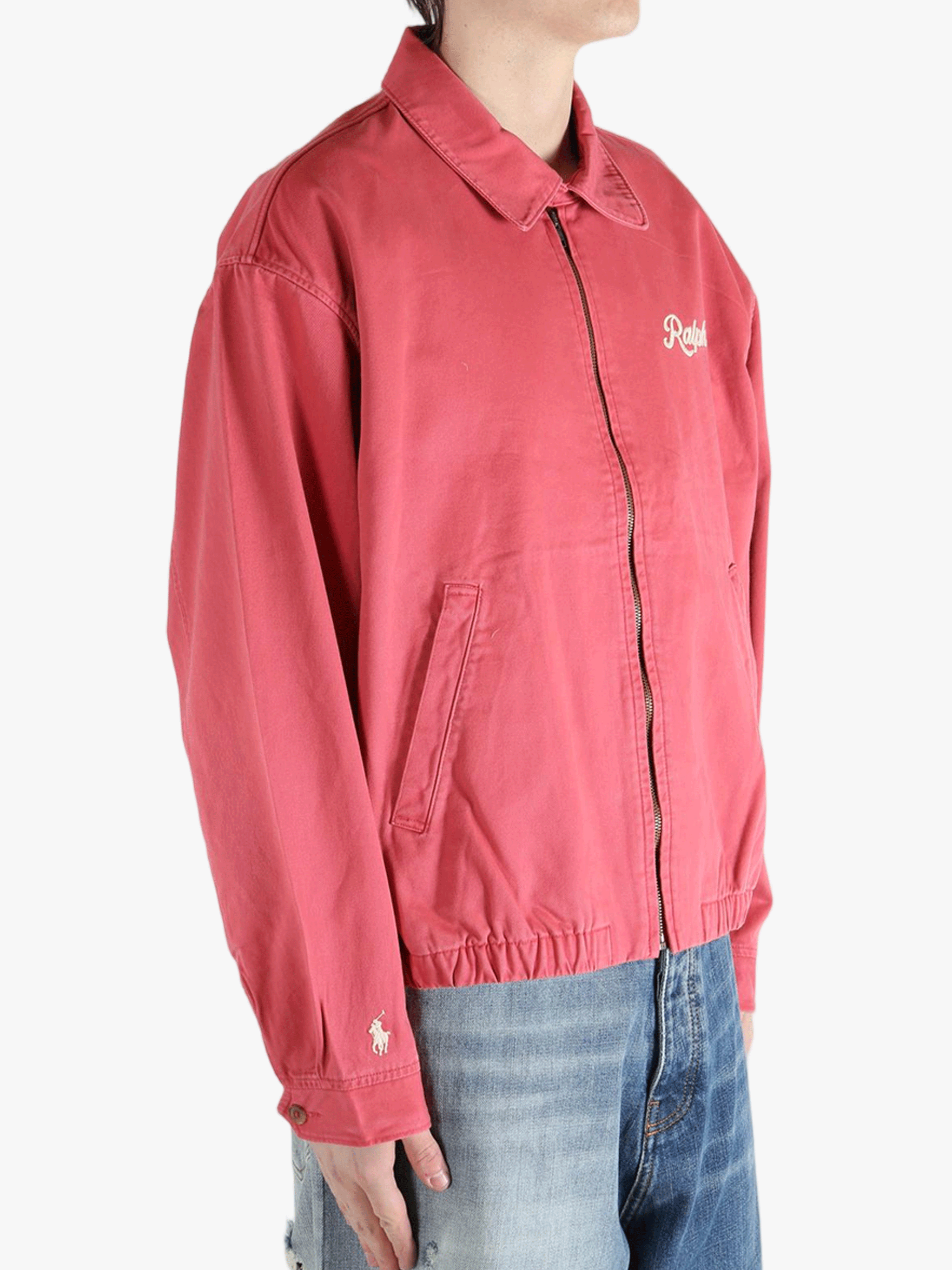 Red jacket worn by a person, showing the jacket's fit