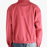 Red jacket worn by a person, showing the jacket's fit