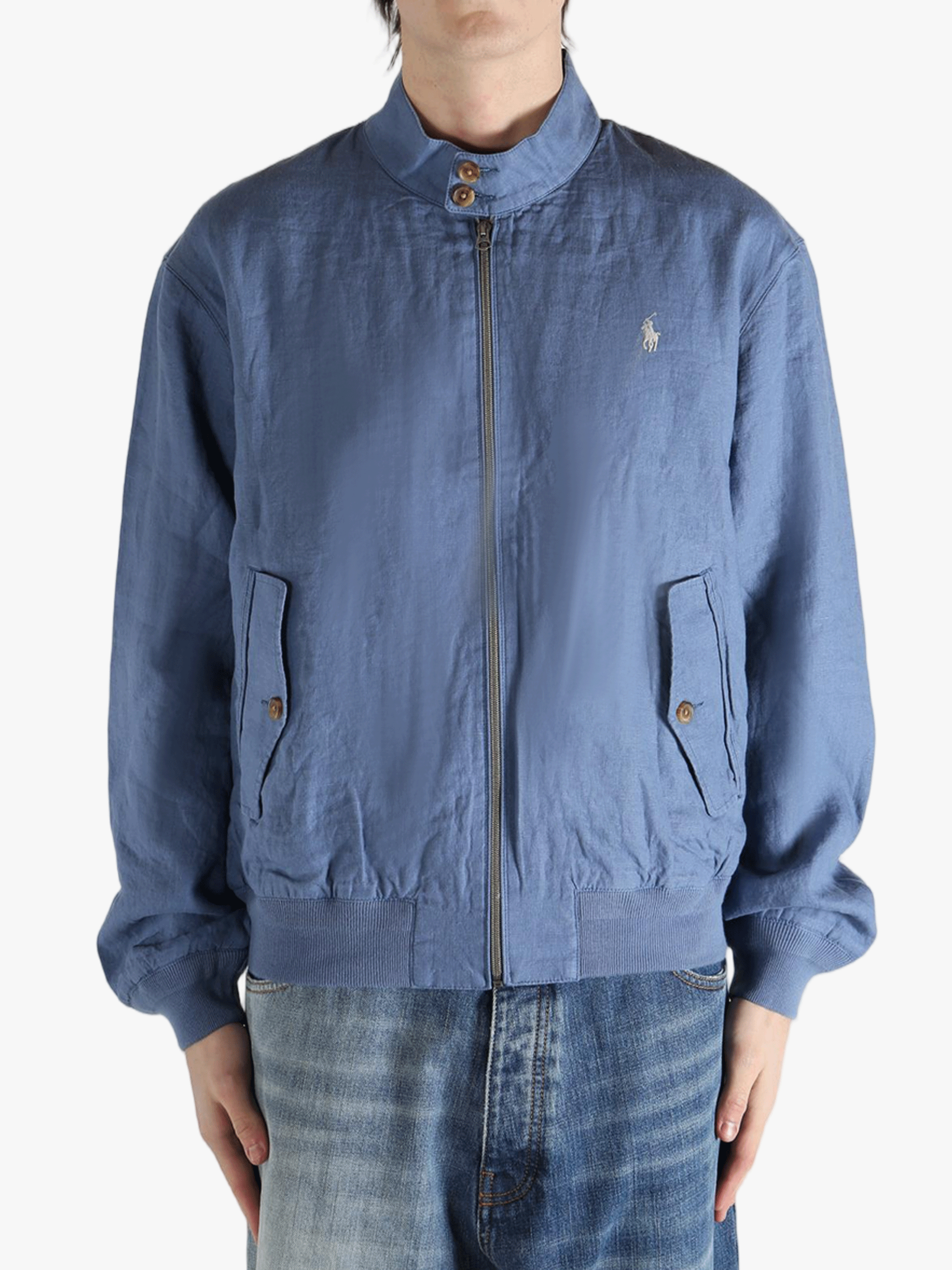 Blue jacket worn by a person, showing the jacket's fit