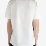 White T-shirt worn by a person, showing the T-shirt's fit