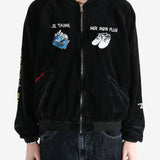 Black jacket worn by a person, showing the  jacket  fit