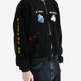 Black jacket worn by a person, showing the  jacket  fit