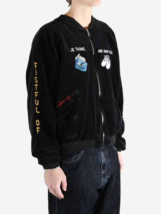 Black jacket worn by a person, showing the  jacket  fit