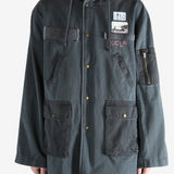 Black jacket worn by a person, showing the jacket fit