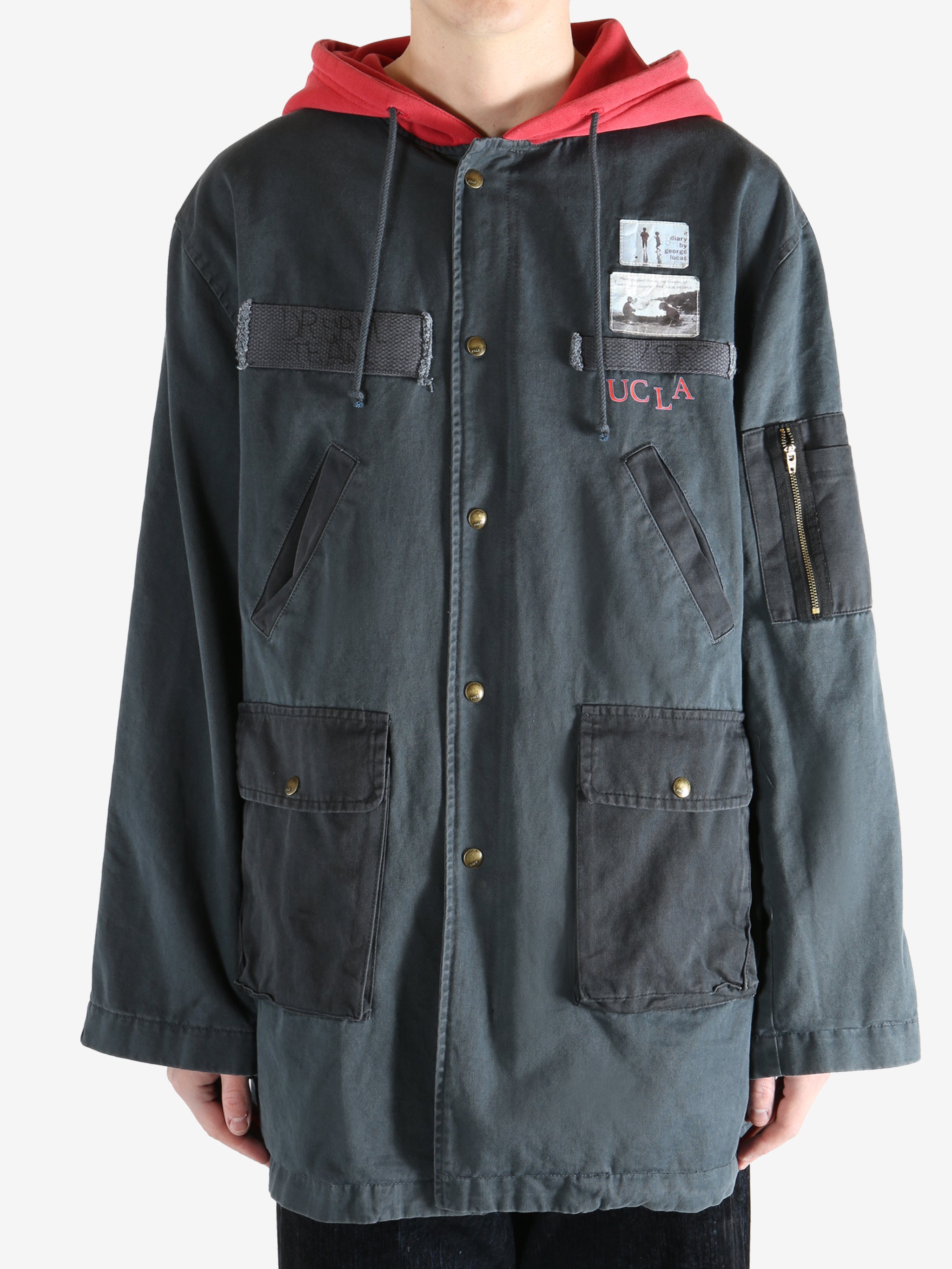 Black jacket worn by a person, showing the jacket fit