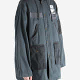 Black jacket worn by a person, showing the jacket fit