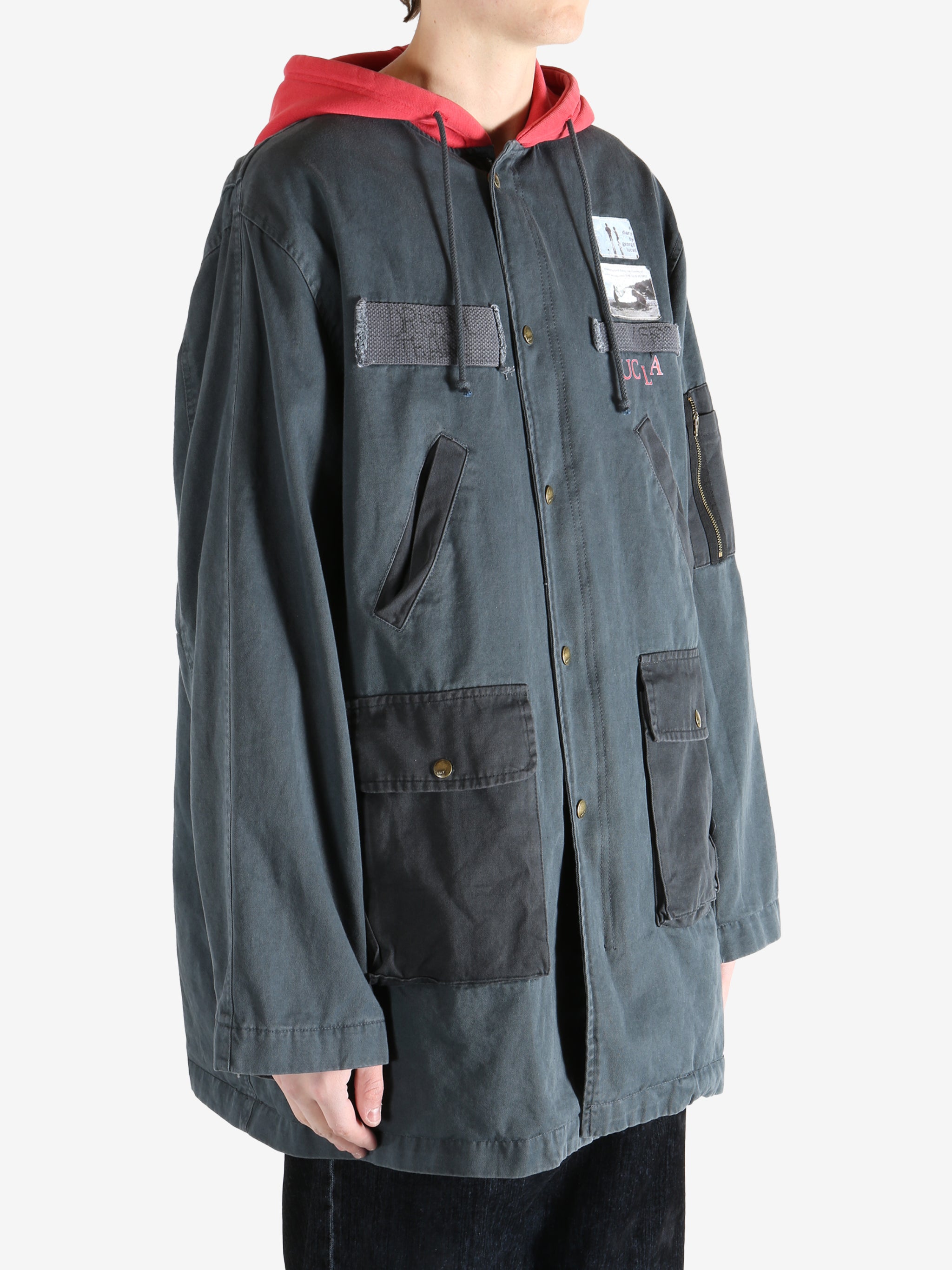 Black jacket worn by a person, showing the jacket fit