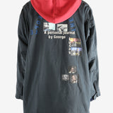 Black jacket worn by a person, showing the jacket fit