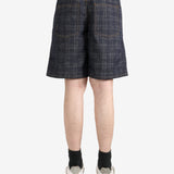 Black pants worn by a person, showing the pants fit