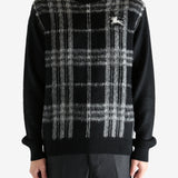 Black Sweater worn by a person, showing the sweater's fit