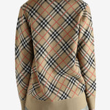 Burberry checkered cardigan worn by a person, showing the cardigan fit