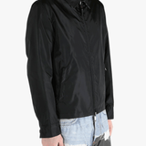 Black jacket worn by a person, showing the  jacket's fit