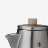 Close up of Grey kettle, showing texture of the Stainless steel fabric