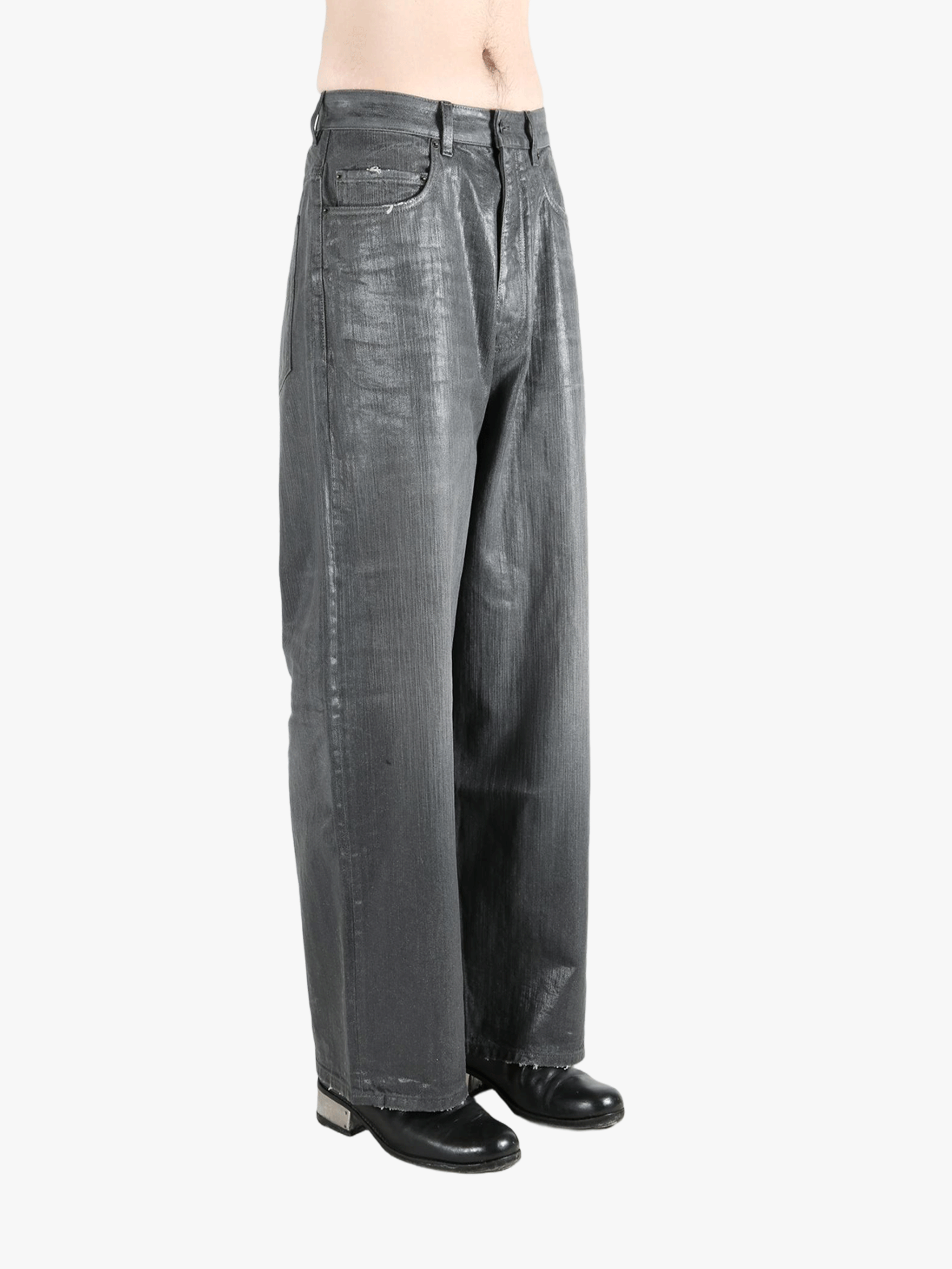 Grey pants worn by a person, showing the pants fit