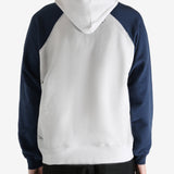 White hoodie worn by a person, showing the hoodie's fit