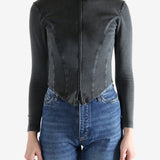 Black hoodie worn by a person, showing the hoodie's fit