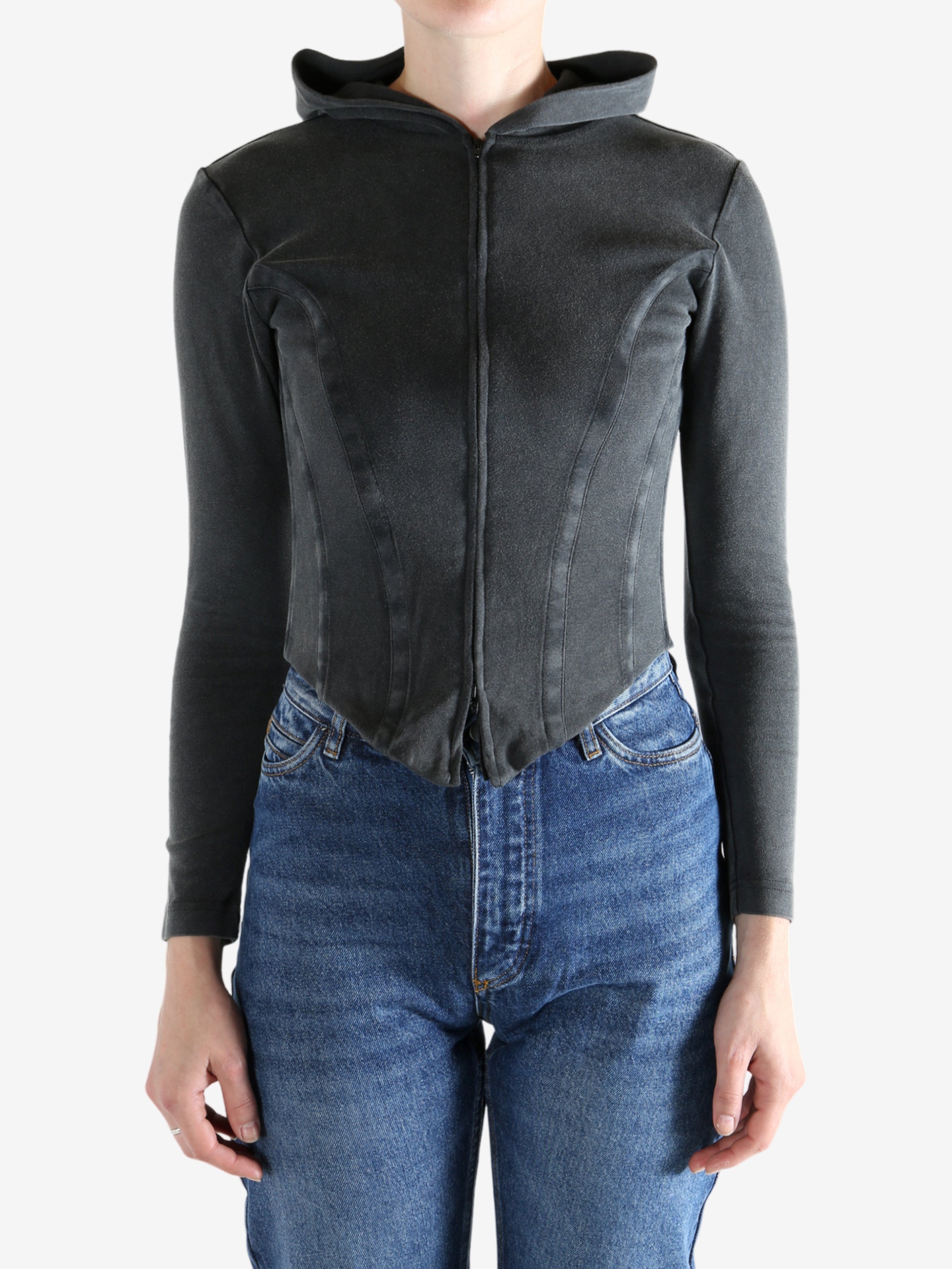 Black hoodie worn by a person, showing the hoodie's fit