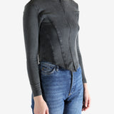 Black hoodie worn by a person, showing the hoodie's fit