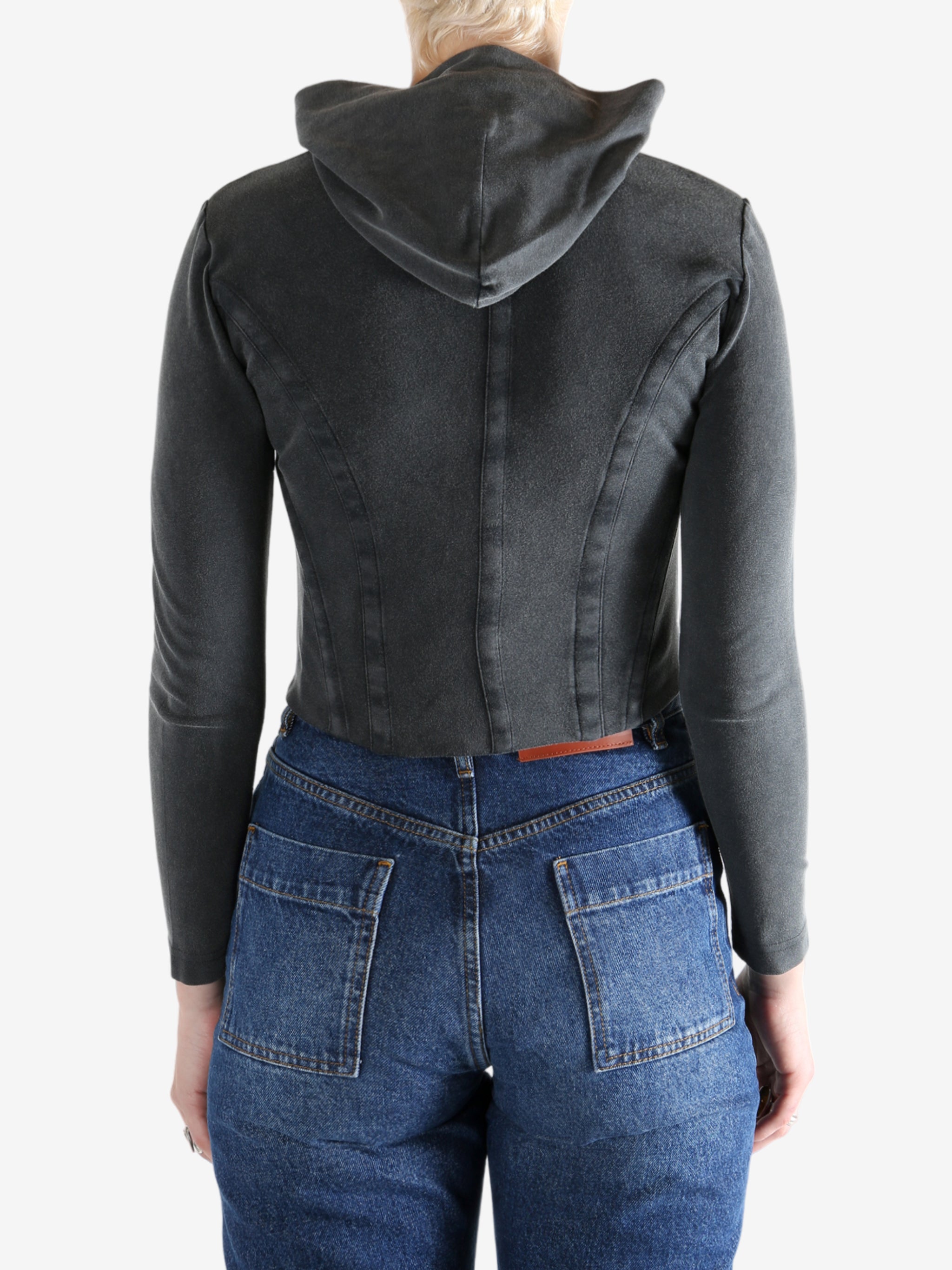 Black hoodie worn by a person, showing the hoodie's fit