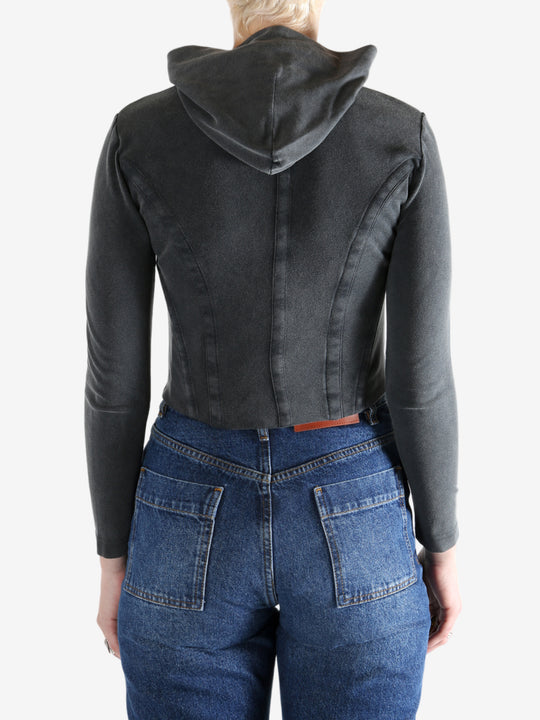 Black hoodie worn by a person, showing the hoodie's fit