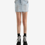 Blue skirt worn by a person, showing the skirt's fit