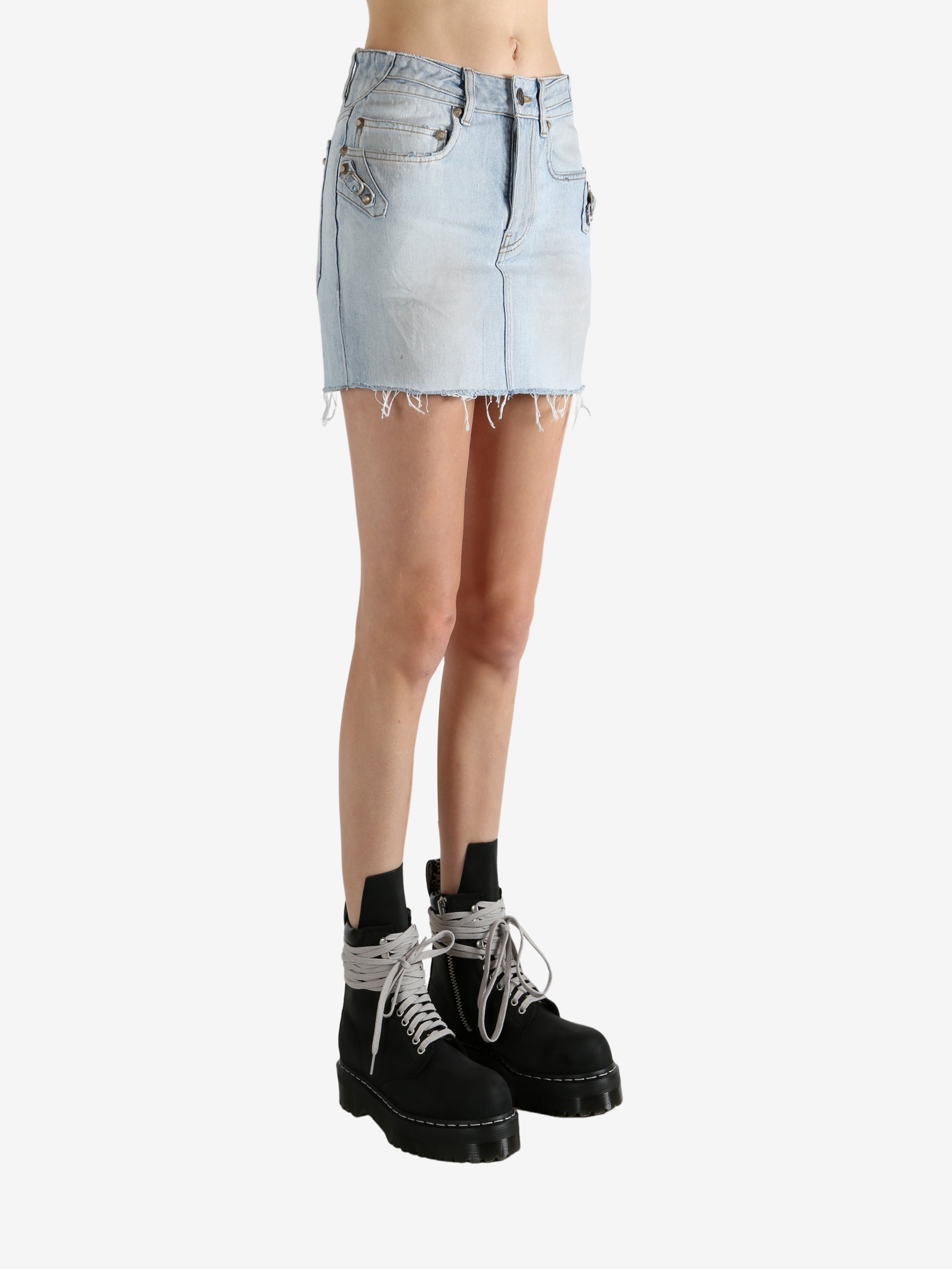 Blue skirt worn by a person, showing the skirt's fit