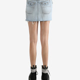 Blue skirt worn by a person, showing the skirt's fit