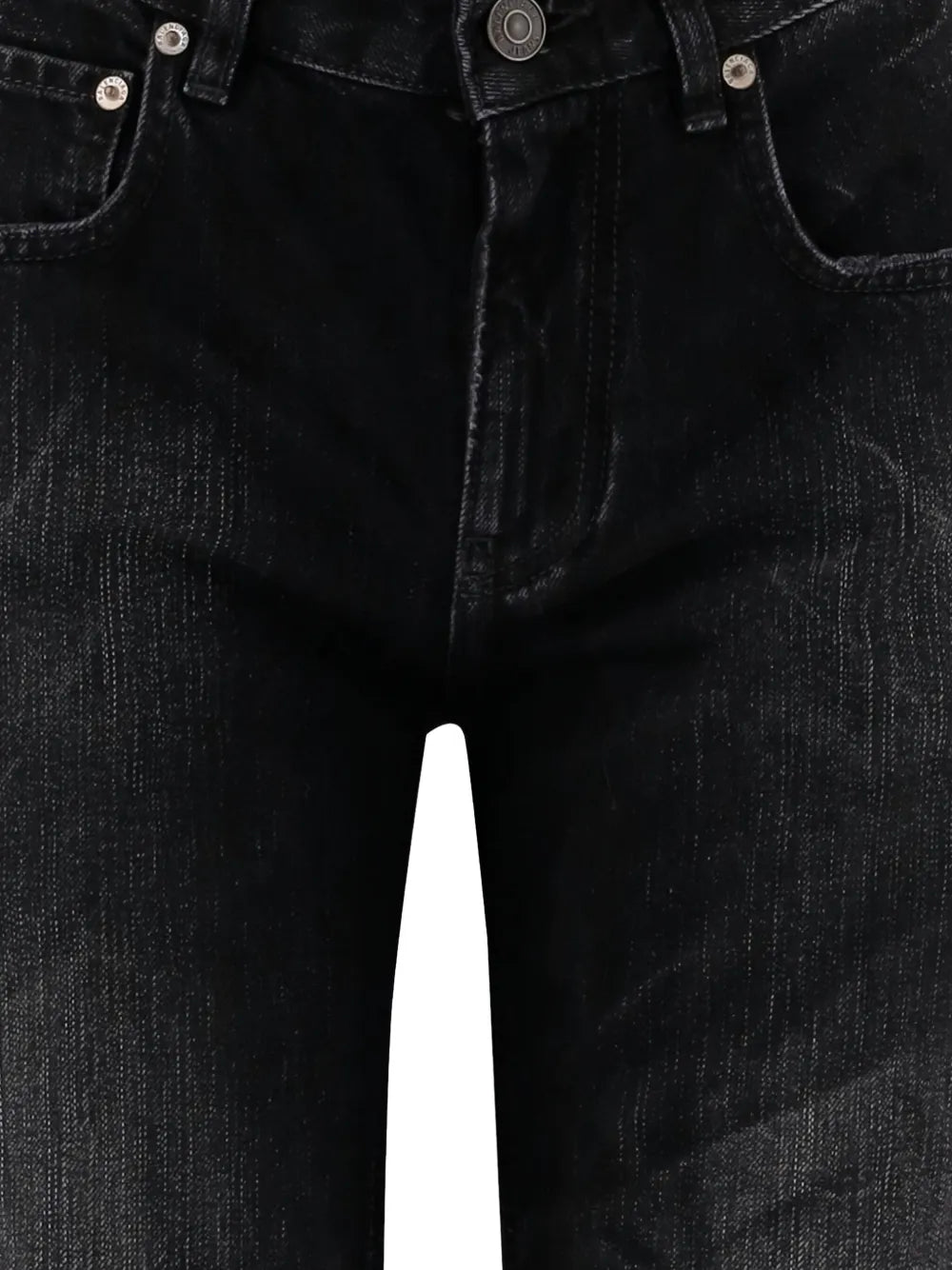 Close up of black pants,showing texture of the cotton fabric.