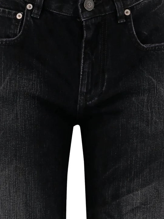 Close up of black pants,showing texture of the cotton fabric.