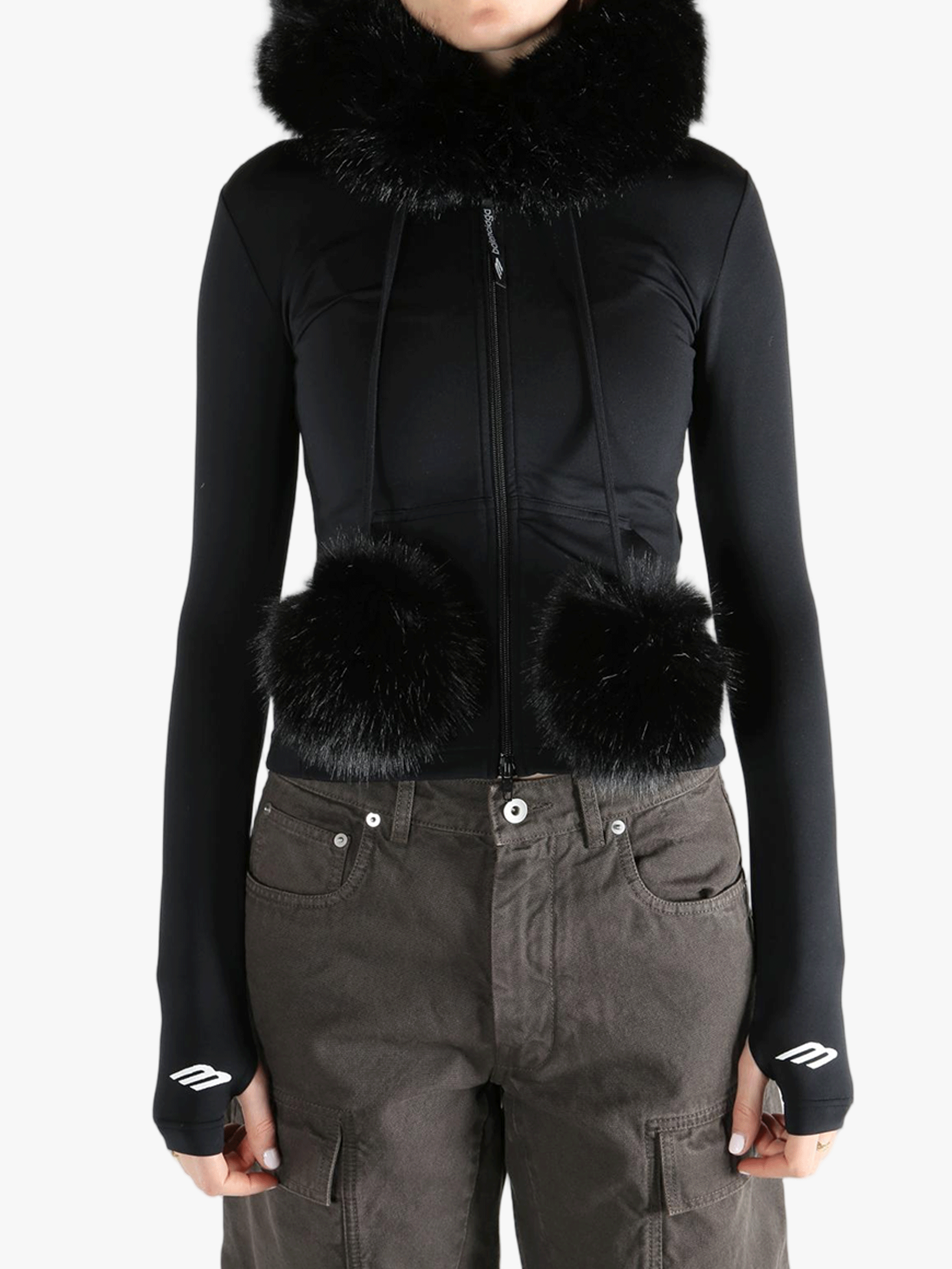 Black top  worn by a person, showing the top 's fit