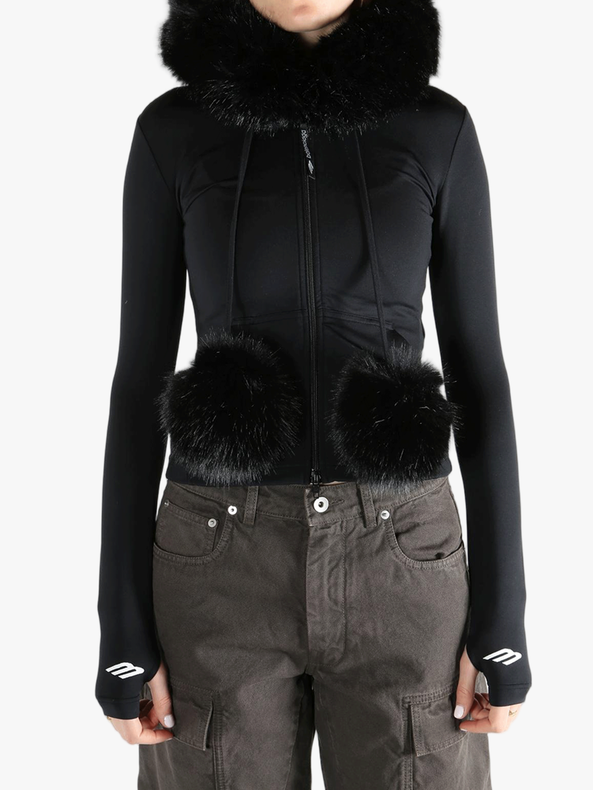 Black top  worn by a person, showing the top 's fit