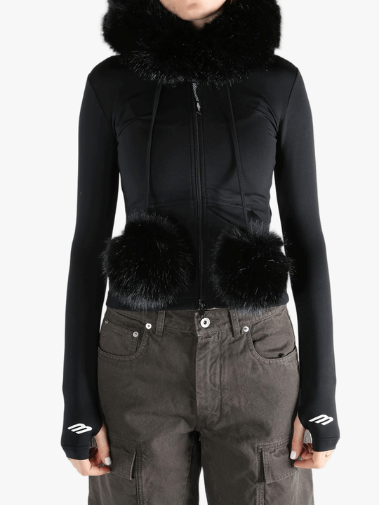 Black top  worn by a person, showing the top 's fit