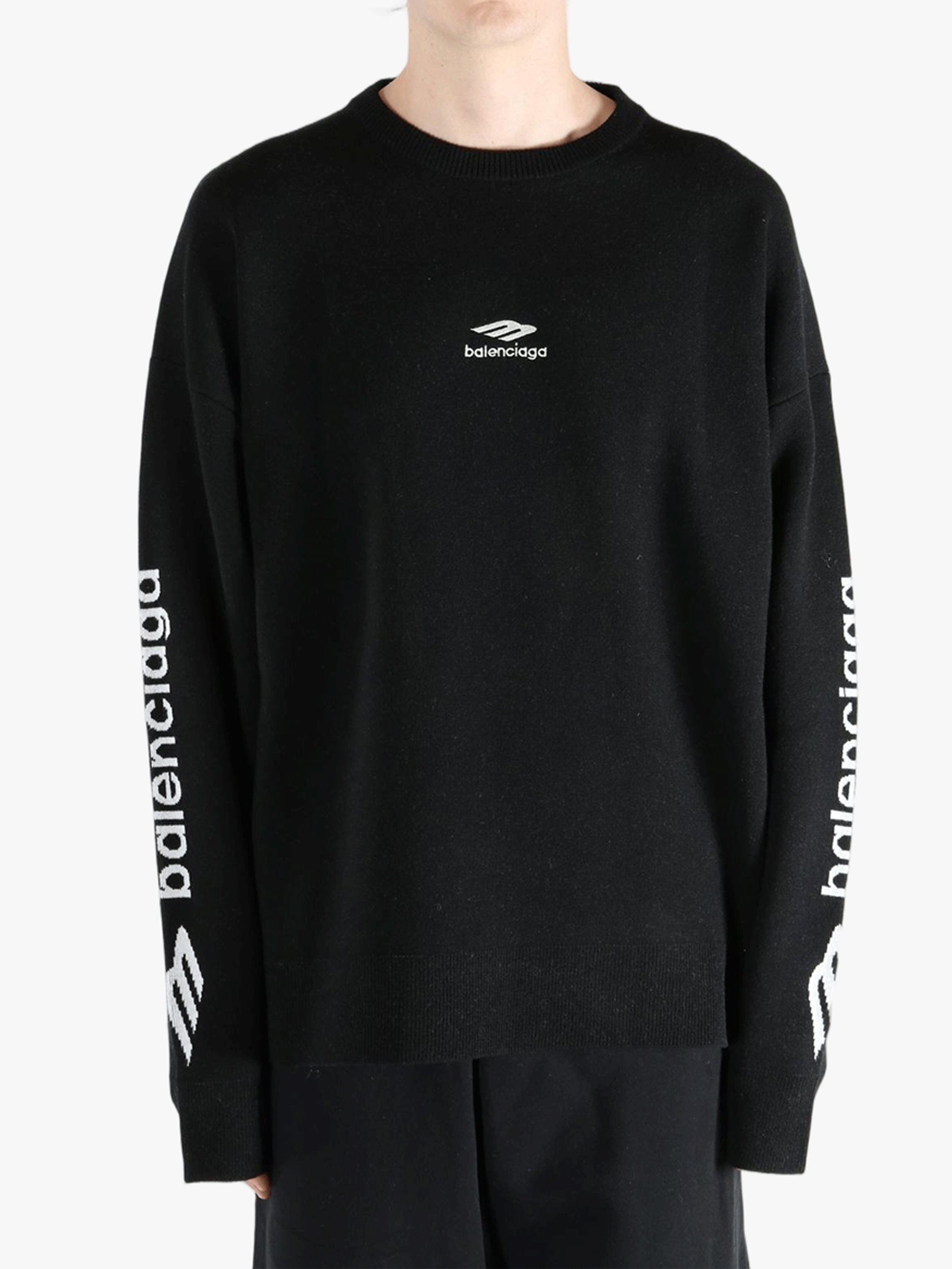 Black top worn by a person, showing the top's fit