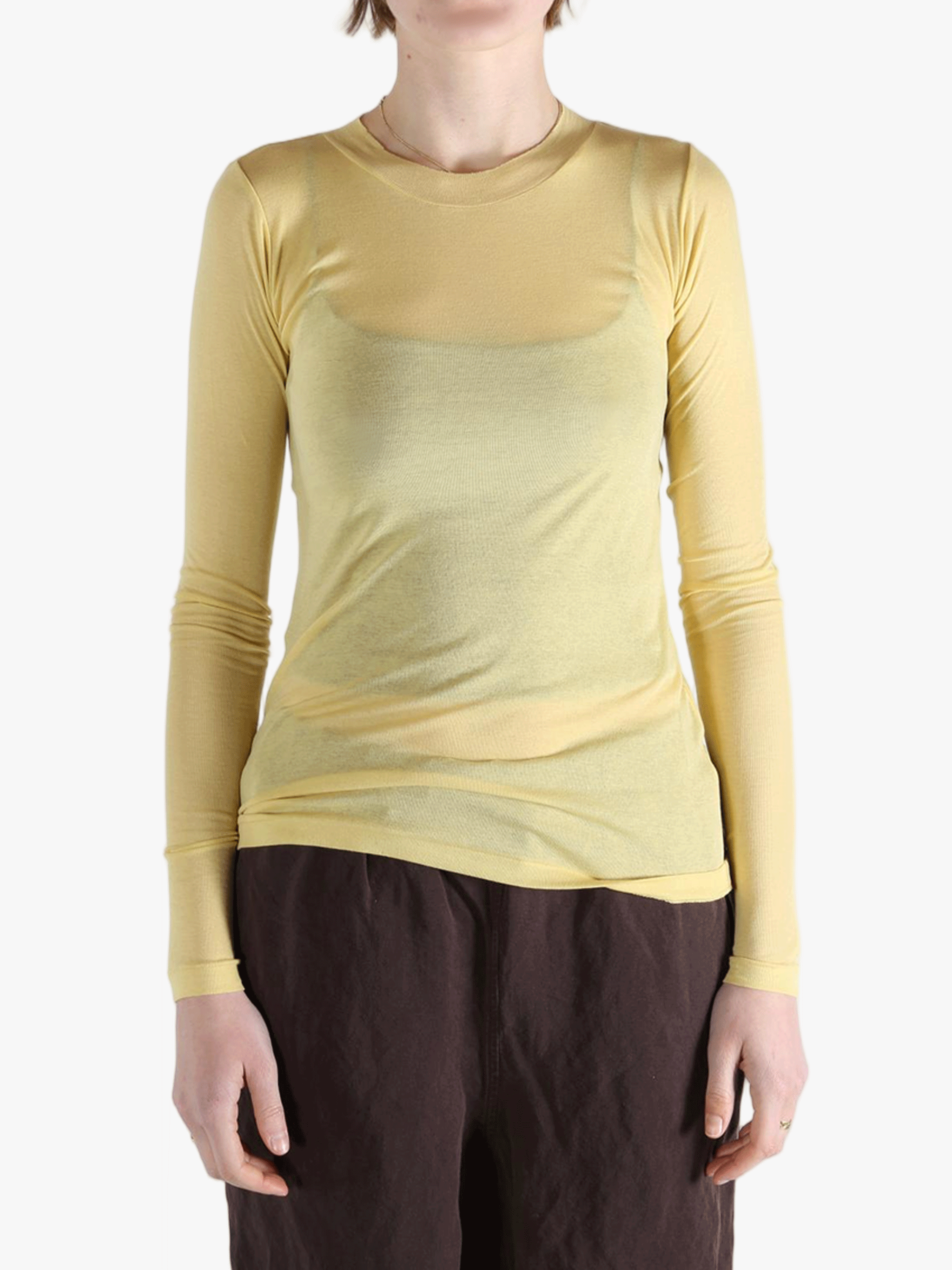 Yellow t-shirt worn by a person, showing the shirt's fit
