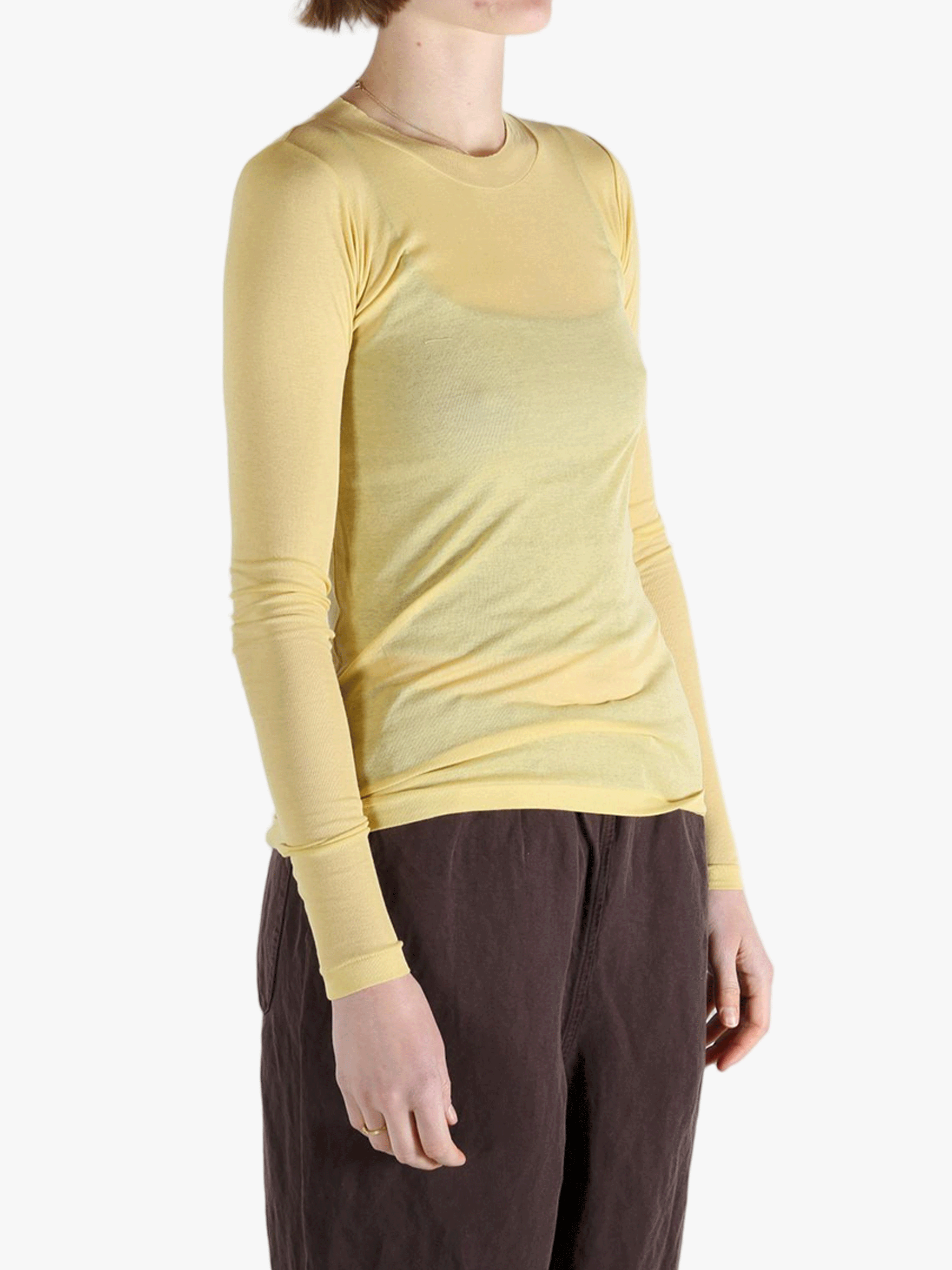 Yellow t-shirt worn by a person, showing the shirt's fit
