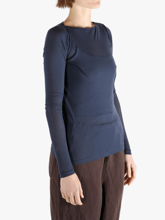 Navy t-shirt worn by a person, showing the t-shirt's fit