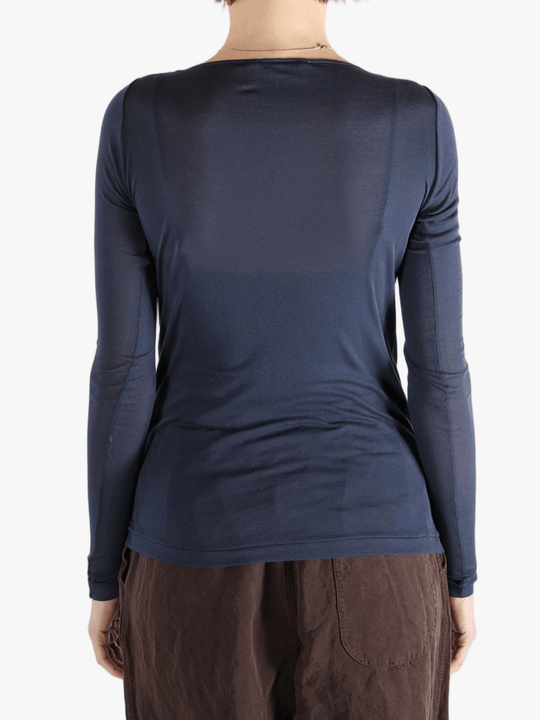 Navy t-shirt worn by a person, showing the t-shirt's fit