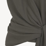 Close up of grey top, showing texture of the fabric