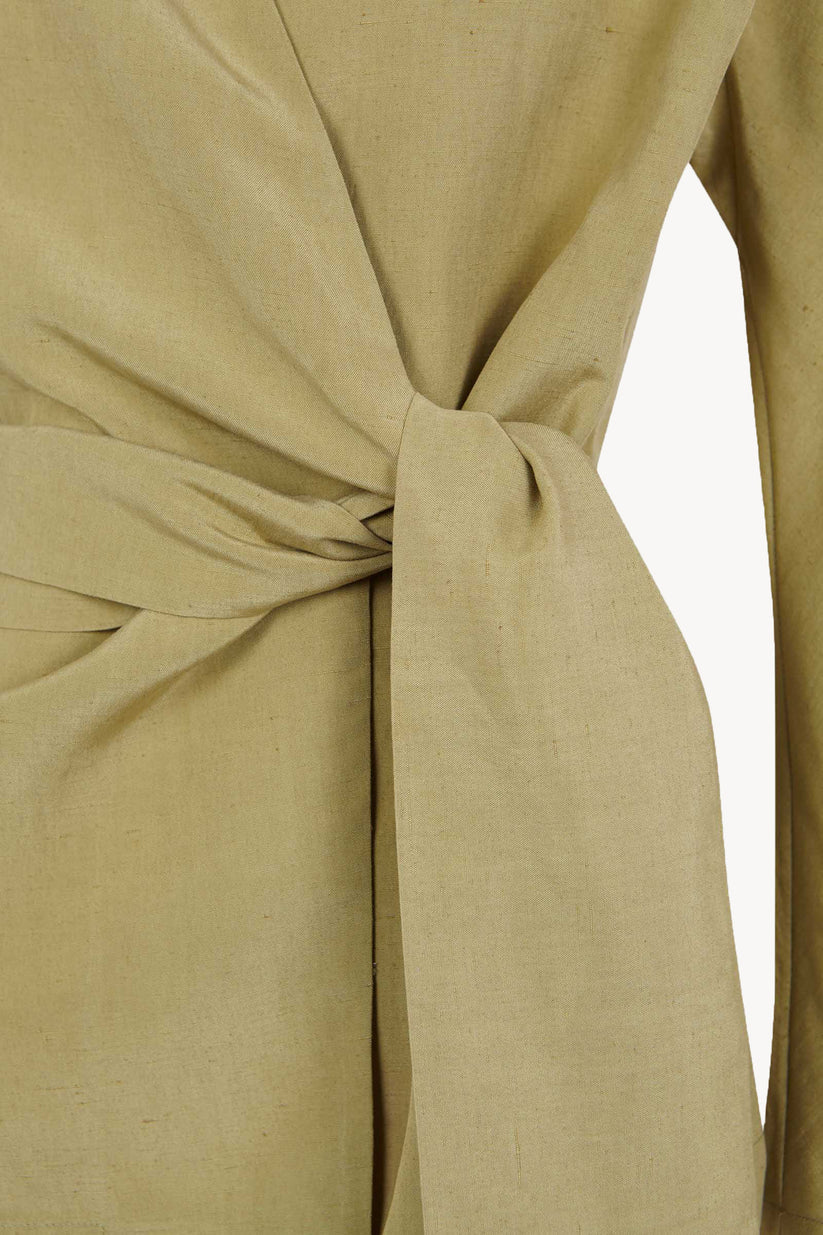 Close up of tan jacket, showing texture of the  Linen and Silk fabric