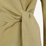 Close up of tan jacket, showing texture of the  Linen and Silk fabric