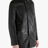 Black jacket worn by a person, showing the jacket's fit