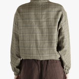 Brown jackets-coats worn by a person, showing the  jackets-coats's fit