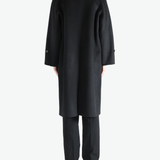 Black coats, full body view