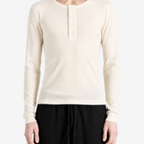 Tan top worn by a person, showing the top fit
