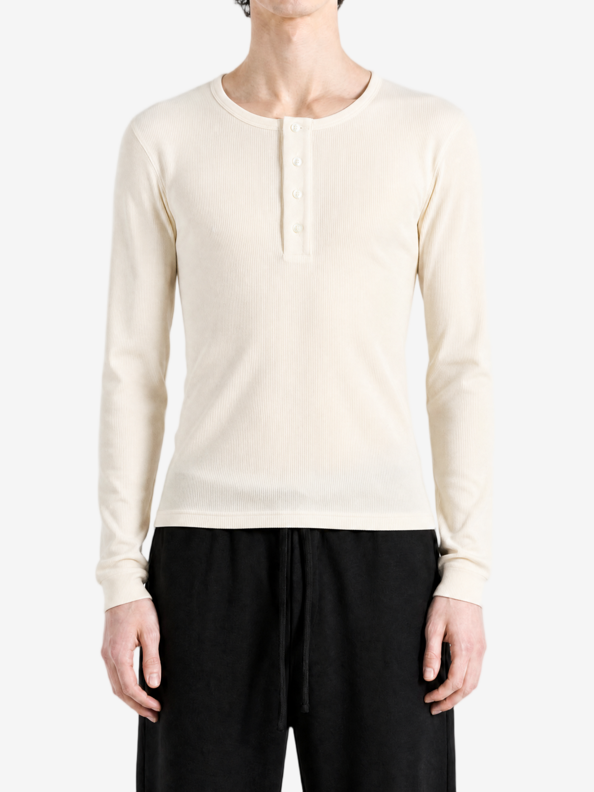 Tan top worn by a person, showing the top fit