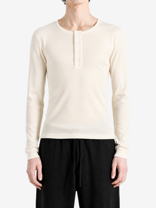 Tan top worn by a person, showing the top fit