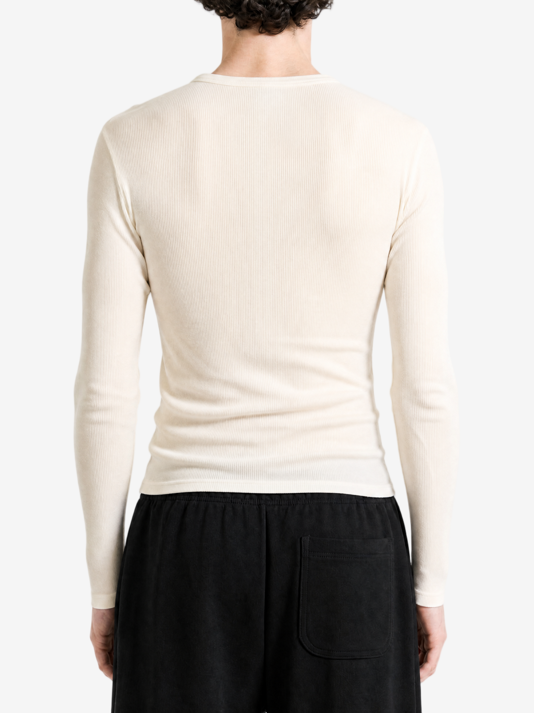 Tan top worn by a person, back view