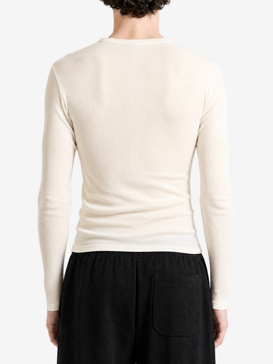 Tan top worn by a person, back view